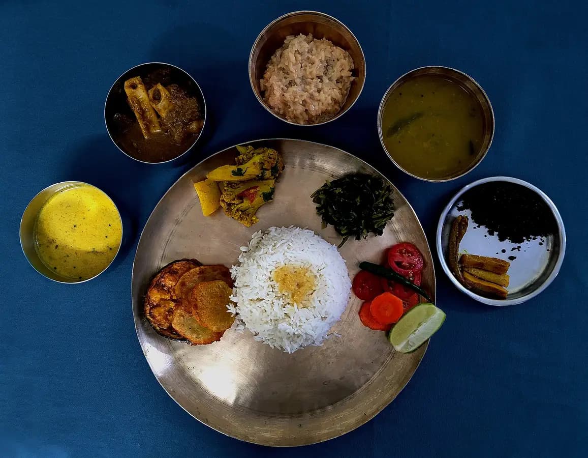 A home-cooked thali served at a homestay