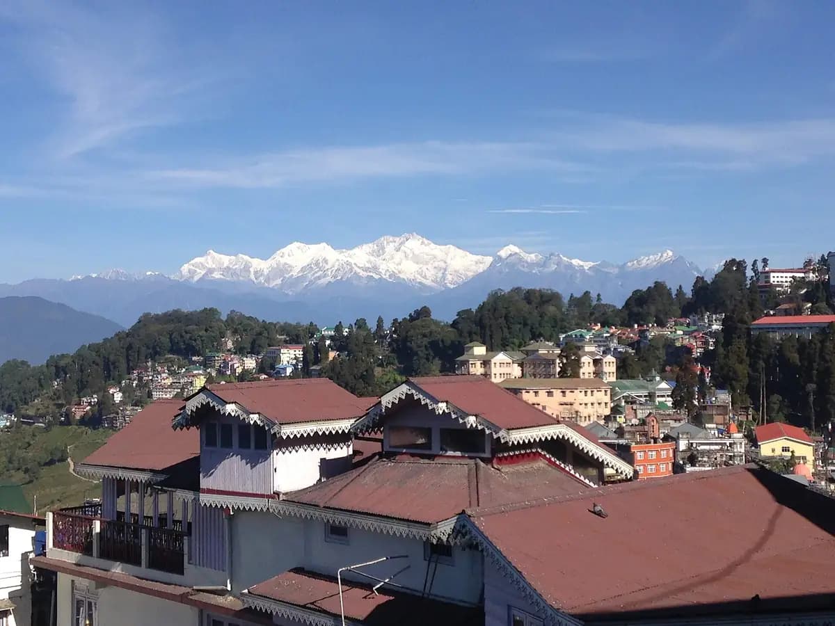 Kanchenjunga rising above the rooftops of Darjeeling